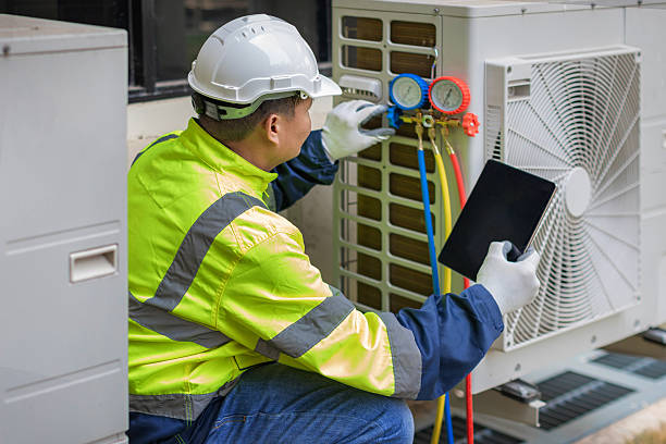 Professional Air Conditioning Repair technician working in Summerfield, IL